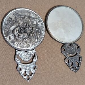 Vintage Silver Hand Mirror with Intricate Design